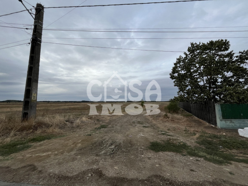 Teren intravilan 1100 mp lot de casa stradal Merii