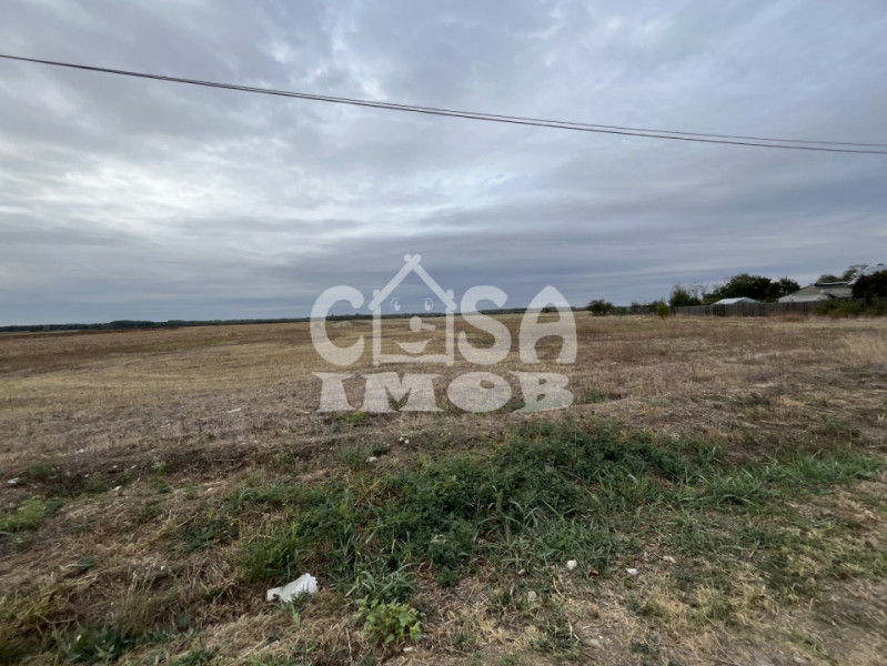 Teren intravilan 1100 mp lot de casa stradal Merii