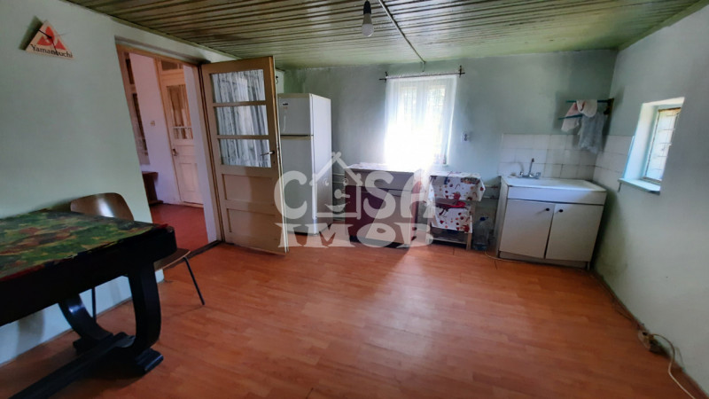  Vânzare casă și teren 1.845 mp în oraș RĂCARI, jud.Dâmbovița