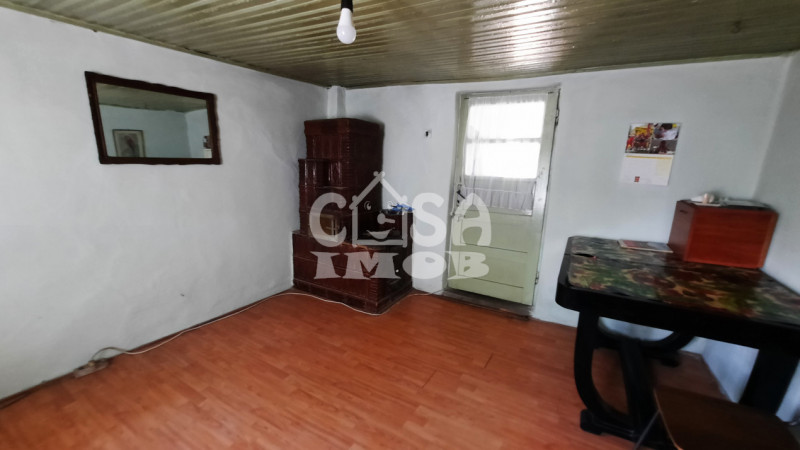  Vânzare casă și teren 1.845 mp în oraș RĂCARI, jud.Dâmbovița