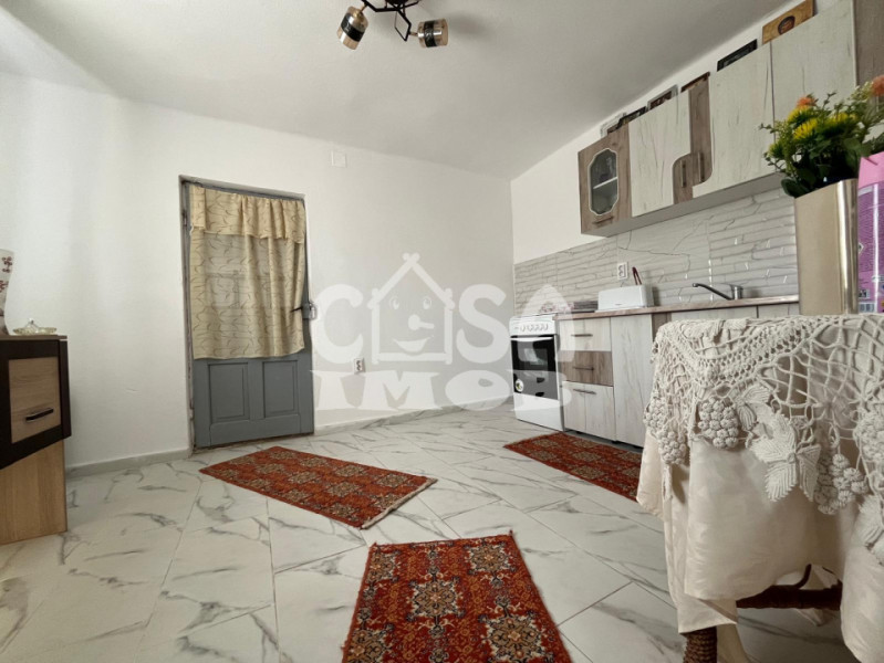 Casa parter + anexa renovata cu teren la strada